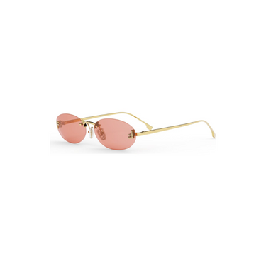 "Gafas Fendi con montura dorada y lentes ovaladas rosadas. Un toque de feminidad y sofisticación."
