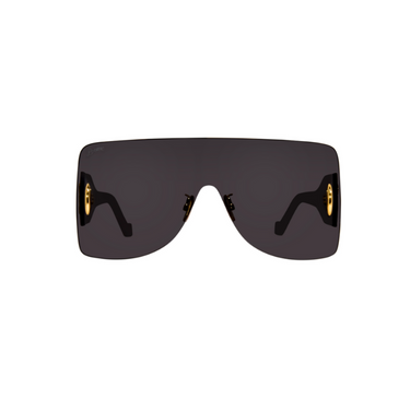 "Gafas Loewe modelo Anagram Mask, con montura negra y lentes oscuras. Destacan los detalles dorados en el frente y las patillas."