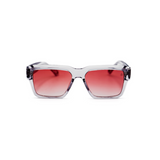 "Gafas Monastery con marco rectangular transparente y lentes rosados."