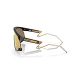 "Gafas Oakley Bxtr Metal con montura de color negro y lentes prizm 24k."