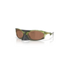 "Gafas Oakley Plantaris con marco de color verde helecho transparente y lentes de color prizm tungsten."
