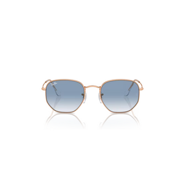 "Gafas Ray-Ban con montura de color oro rosa y lentes de color azul transparente."