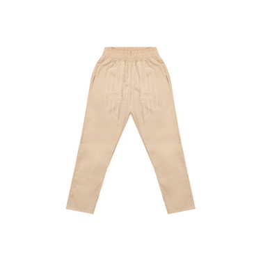 "Pantalón Ap Crown Shiva de color beige con el logotipo estampado en la parte frontal."