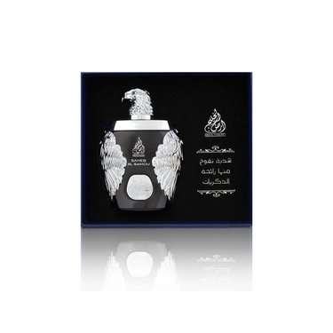 "Perfume Ghala Zayed Saheb Al Samou. Diseño elegante con águila plateada y caligrafía árabe. Símbolo de lujo y sofisticación."